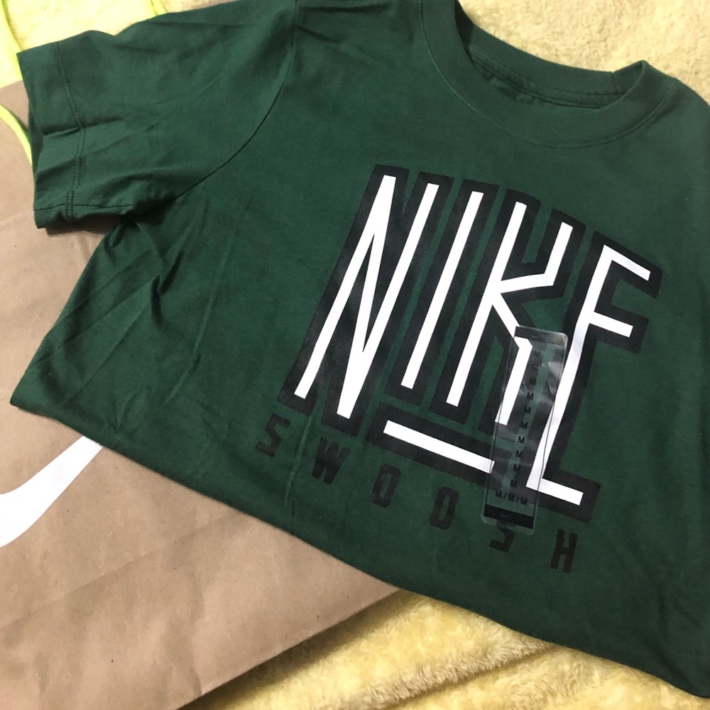 Dark green Nike tee